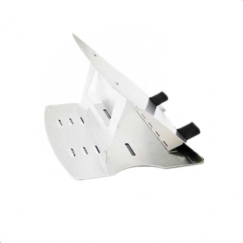 Anti-slip silicone pads on aluminum laptop stand gripping desk